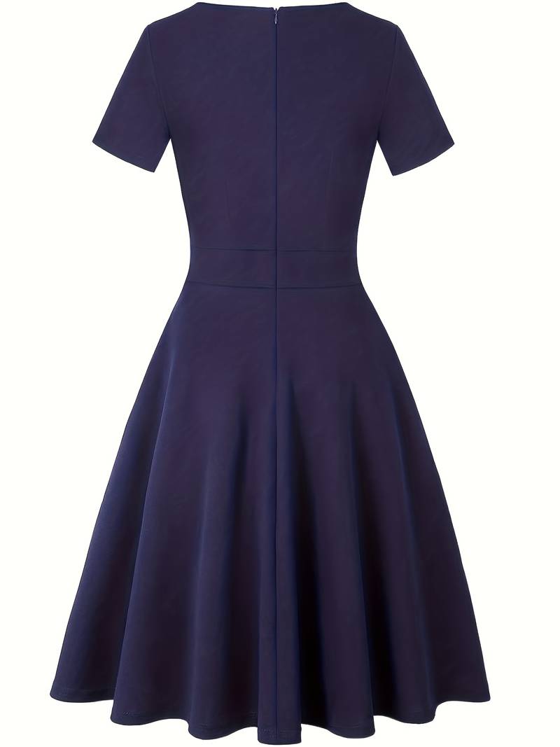 Blue Dress with Lace Accents and Tailored Waist