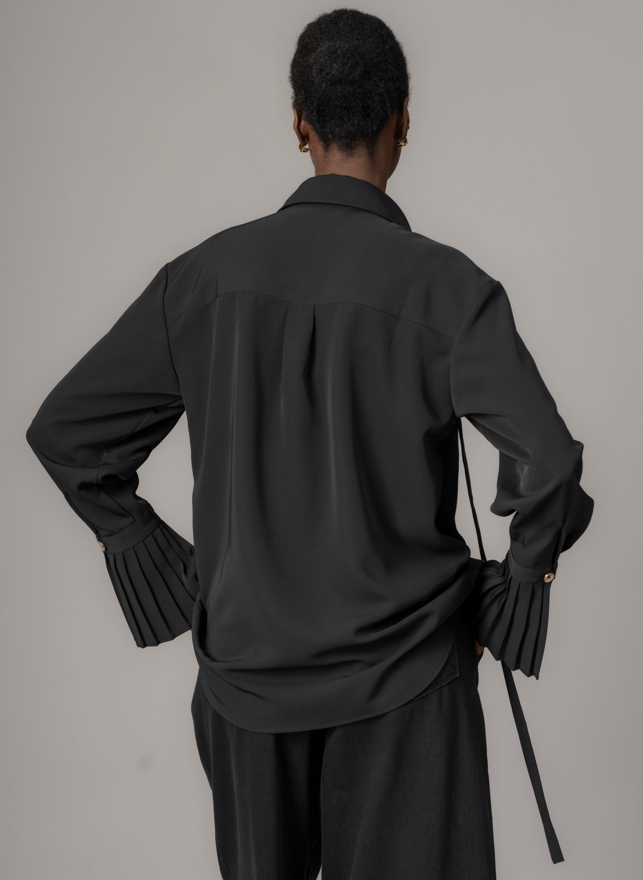 Black Crepe Oversized Blouse for Women — Exaggerated Pleated Cuffs - gallery